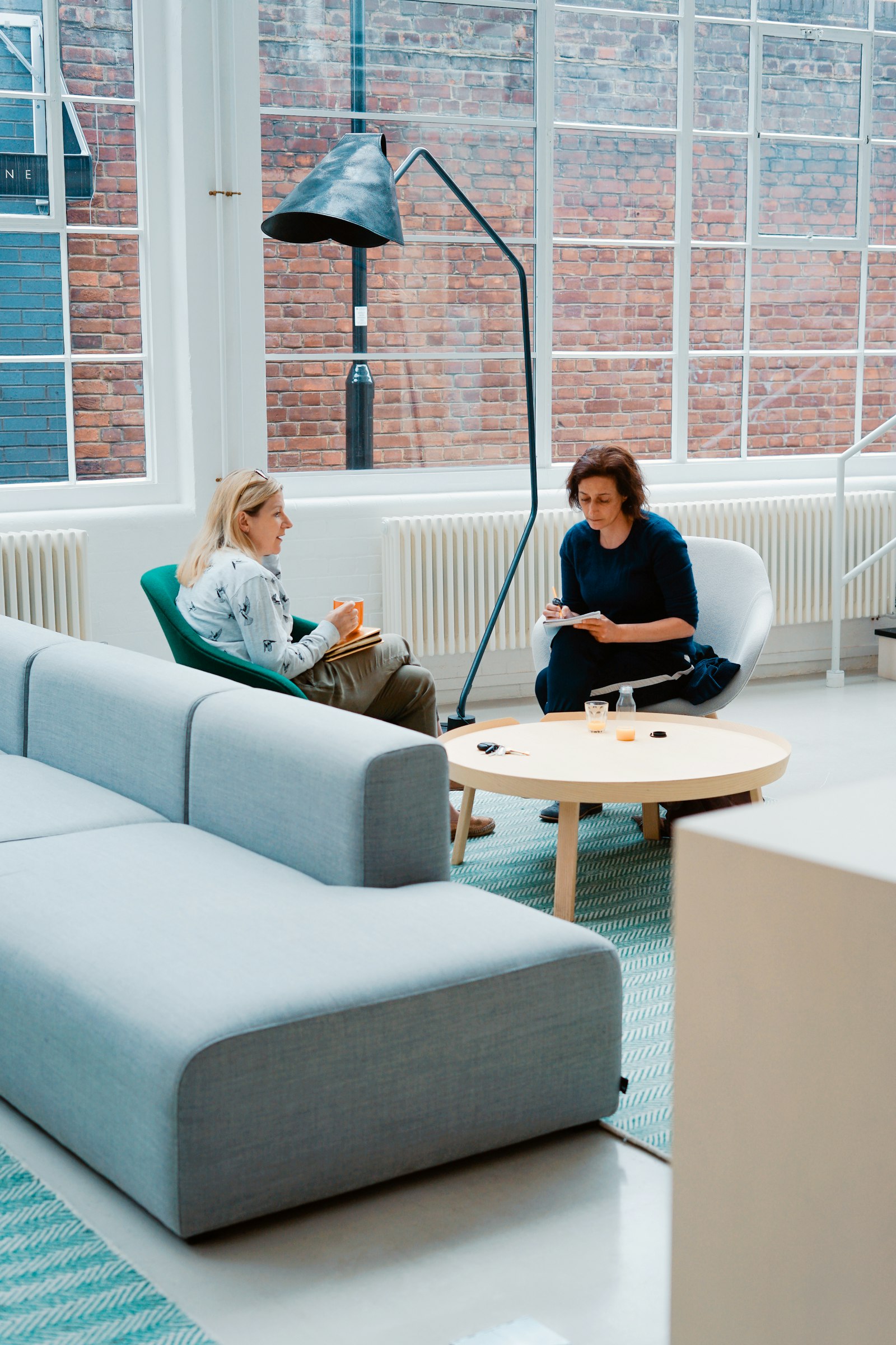 Business professionals in a modern lobby